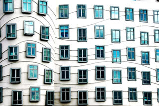 Dancing house windows by Mounirzok is licensed under CC BY-SA 4.0