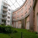 Gasometer D in Vienna, Austria by Andreas Poeschek is licensed under CC BY-SA 2.0 AT