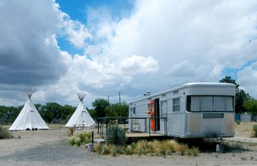 “1956 IMPERIAL MANSION and Tee Pees” by PunkToad is licensed under CC BY 2.0